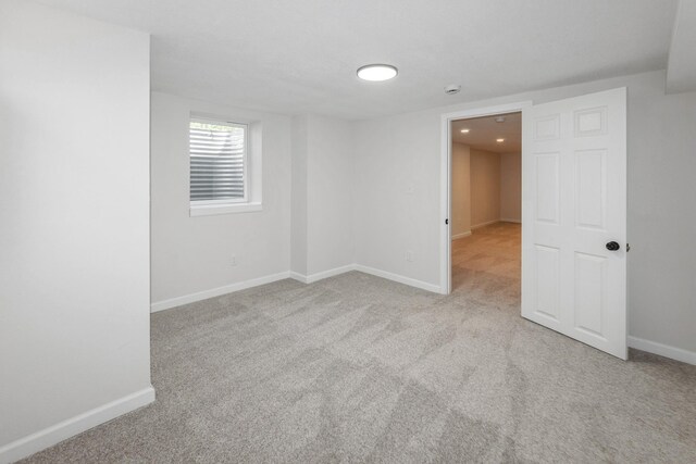 2311 50th St, Des Moines, IA 50310 - unfurnished room featuring carpet and baseboards