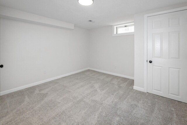 2311 50th St, Des Moines, IA 50310 - basement with carpet flooring and baseboards