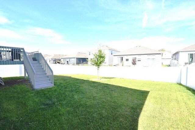 2010 N 7th St, Indianola, IA 50125 - view of yard featuring stairway and a residential view