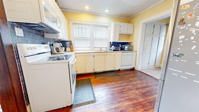 1415 46th St, Des Moines, IA 50311 - kitchen with white appliances, ornamental molding, a sink, dark wood-style flooring, and backsplash