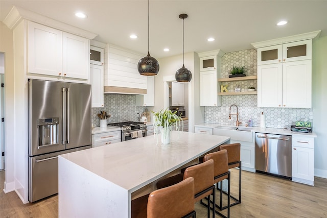 2770 NW 167th St, Clive, IA 50325 - kitchen with high end appliances, a sink, open shelves, a kitchen island, and tasteful backsplash