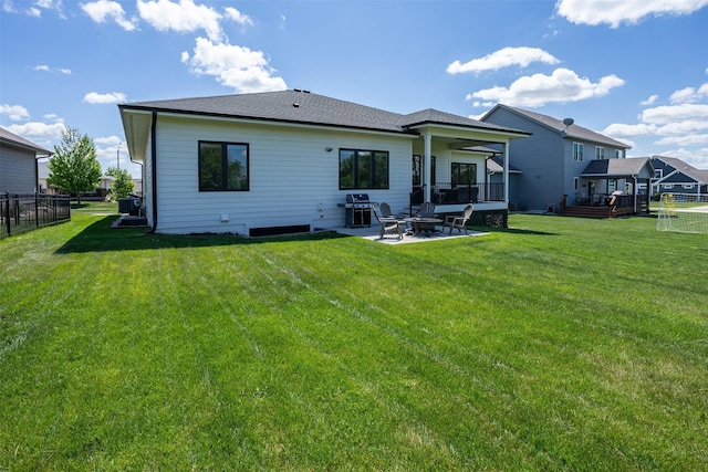 2770 NW 167th St, Clive, IA 50325 - back of house with a patio area, a fire pit, and roof with shingles