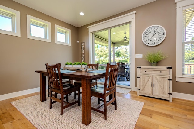 dining area featuring light wood finished floors, recessed lighting, baseboards, and a ceiling fan