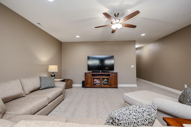 carpeted living room with ceiling fan, recessed lighting, and baseboards