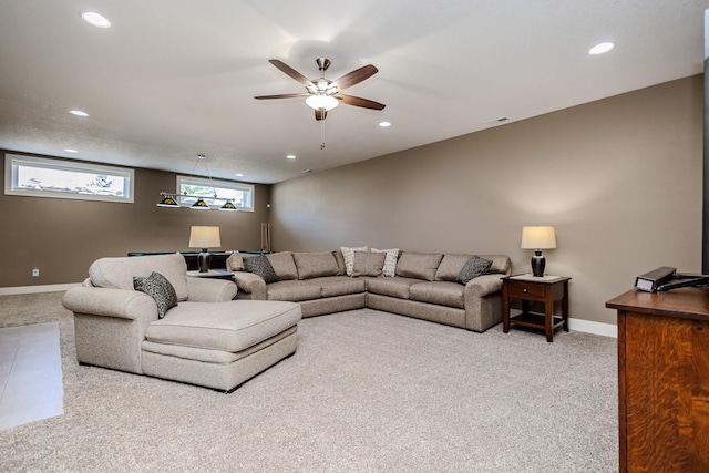 living area featuring carpet floors, recessed lighting, a ceiling fan, and baseboards