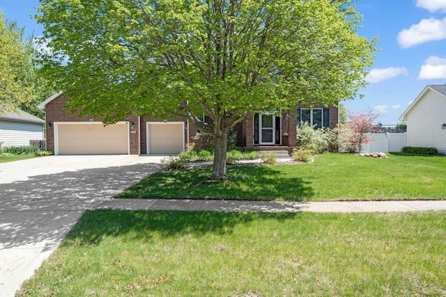 947 11th Ave SE, Altoona, IA 50009 - obstructed view of property with brick siding, driveway, and a garage