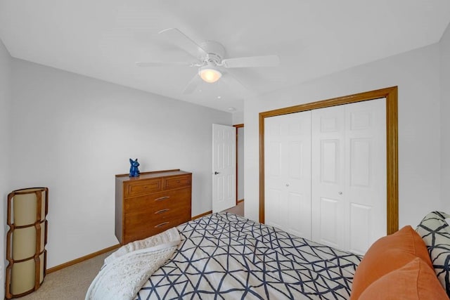 947 11th Ave SE, Altoona, IA 50009 - bedroom featuring baseboards, a closet, a ceiling fan, and light carpet