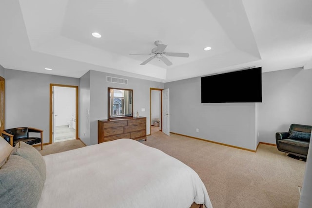 947 11th Ave SE, Altoona, IA 50009 - bedroom featuring a tray ceiling, light carpet, baseboards, recessed lighting, and ceiling fan