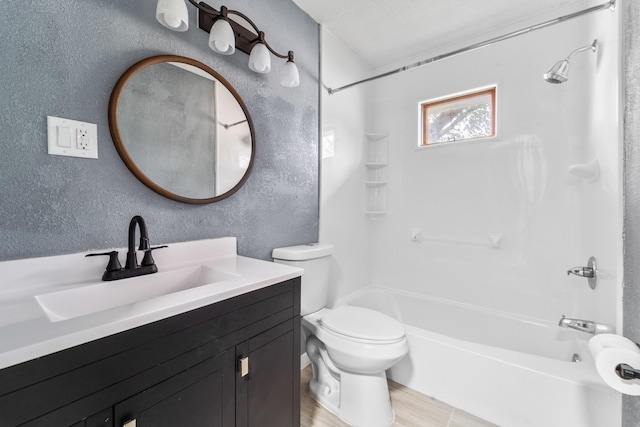 208 Van Buren Dr, Van Meter, IA 50261 - bathroom with a textured wall, toilet, shower / bathtub combination, vanity, and wood finished floors