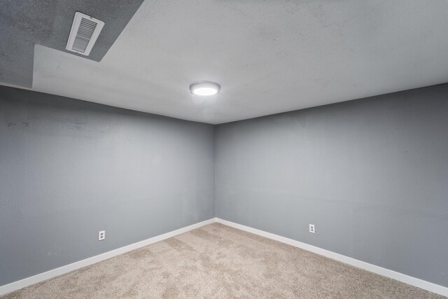 208 Van Buren Dr, Van Meter, IA 50261 - carpeted empty room with baseboards