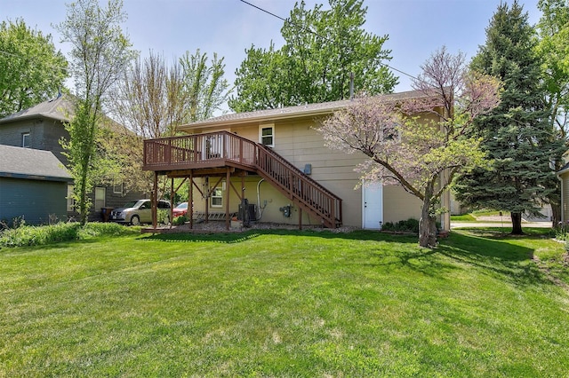 308 Nevada St, Glidden, IA 51443 - back of house with stairway, a deck, and a yard
