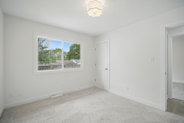 4306 SE 12th St, Des Moines, IA 50315 - carpeted empty room featuring baseboards