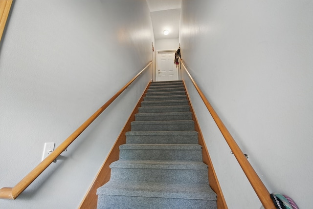 545 Maggie Ln, Altoona, IA 50009 - staircase featuring wood finished floors