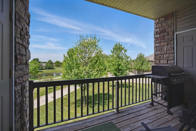 545 Maggie Ln, Altoona, IA 50009 - wooden deck featuring a water view, a yard, and area for grilling