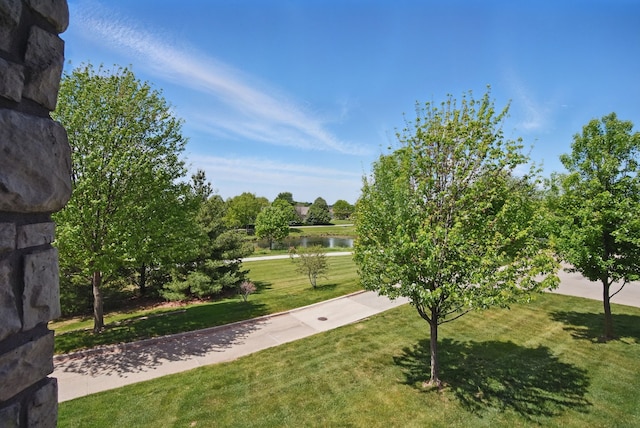 545 Maggie Ln, Altoona, IA 50009 - view of grassy yard with a water view