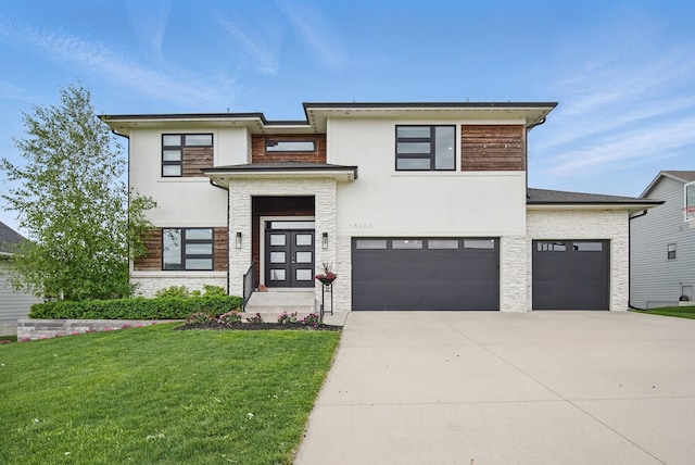 16202 Brookview Dr, Urbandale, IA 50323 - contemporary house with stone siding, a front yard, driveway, and stucco siding