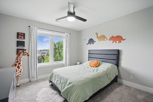 16202 Brookview Dr, Urbandale, IA 50323 - carpeted bedroom with baseboards and ceiling fan