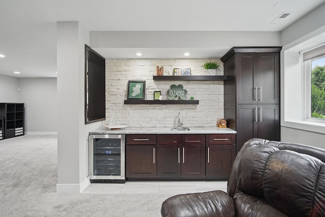 16202 Brookview Dr, Urbandale, IA 50323 - indoor wet bar featuring wine cooler, light colored carpet, baseboards, and recessed lighting