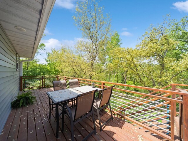 8117 Hickory St, Dexter, IA 50070 - wooden terrace with outdoor dining space