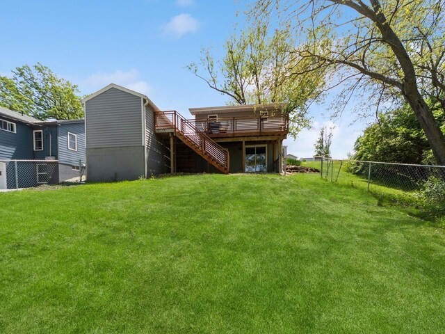 8117 Hickory St, Dexter, IA 50070 - rear view of house featuring stairs and a wooden deck