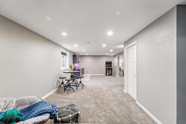 2009 NW Boulder Ridge Ln, Ankeny, IA 50023 - rec room featuring light carpet, recessed lighting, and baseboards