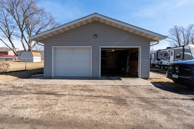 2002 12th St, Eldora, IA 50627 - detached garage featuring fence