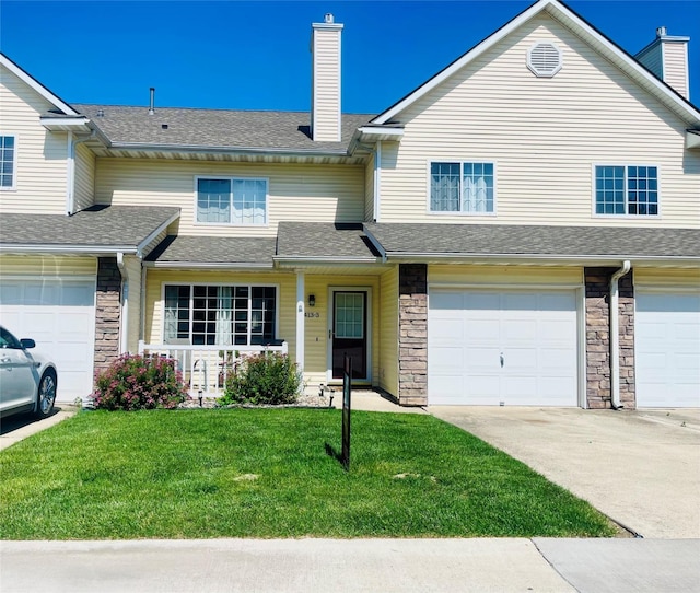 1413 SE Delaware Ave Unit 3, Ankeny, IA 50021 - view of property featuring a chimney, a front yard, a porch, and stone siding