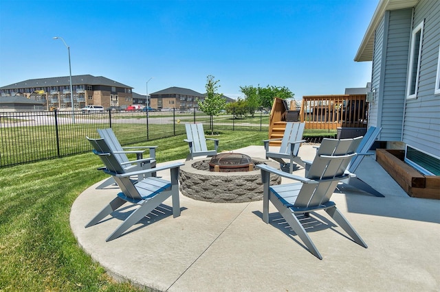 1350 97th St, West Des Moines, IA 50266 - view of patio featuring a fire pit