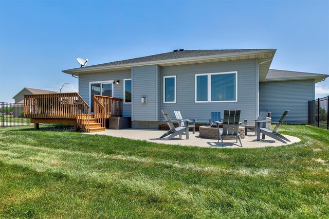 1350 97th St, West Des Moines, IA 50266 - back of house with a deck, a patio, and a fire pit