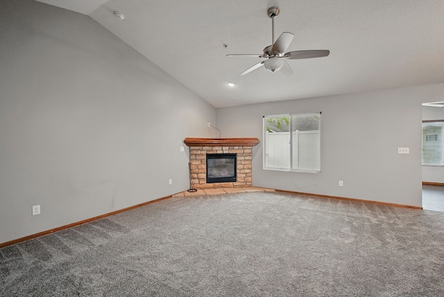 6082 Sheffield Cir, Johnston, IA 50131 - unfurnished living room with lofted ceiling, a ceiling fan, healthy amount of natural light, a fireplace, and baseboards