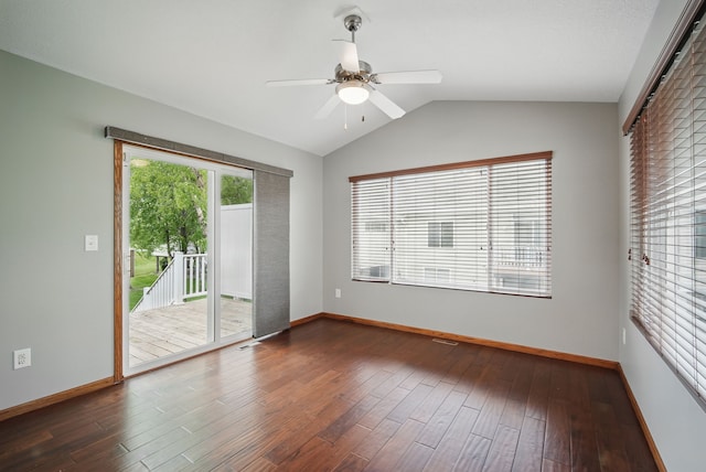 6082 Sheffield Cir, Johnston, IA 50131 - spare room featuring lofted ceiling, ceiling fan, dark wood-style floors, and baseboards