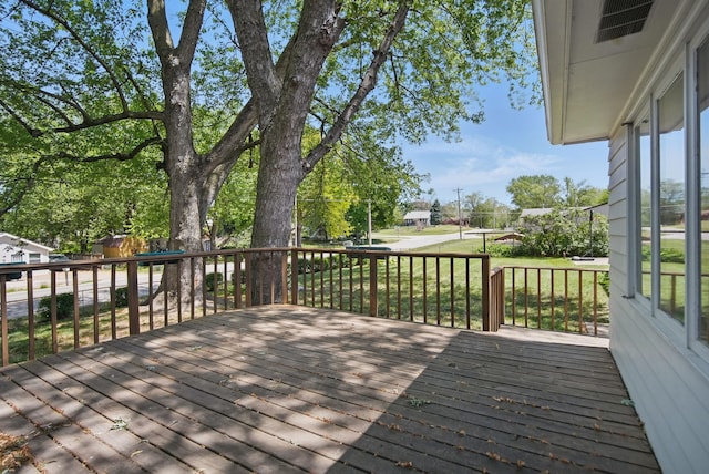 4147 E 7th St, Des Moines, IA 50313 - deck with a lawn