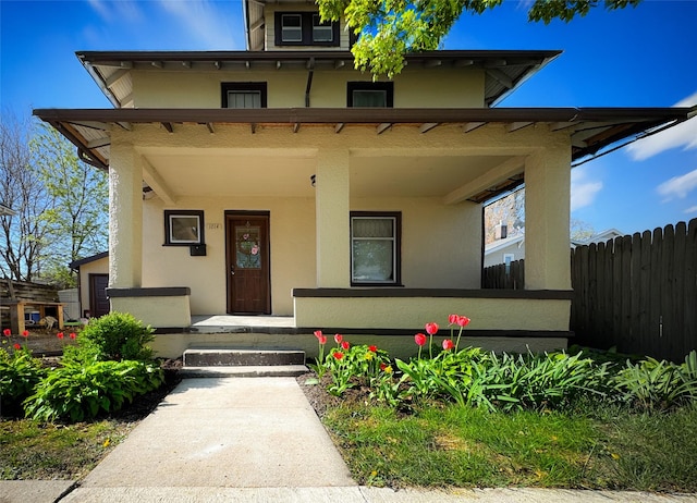 1014 14th St, Boone, IA 50036 - view of front of home with a porch and stucco siding