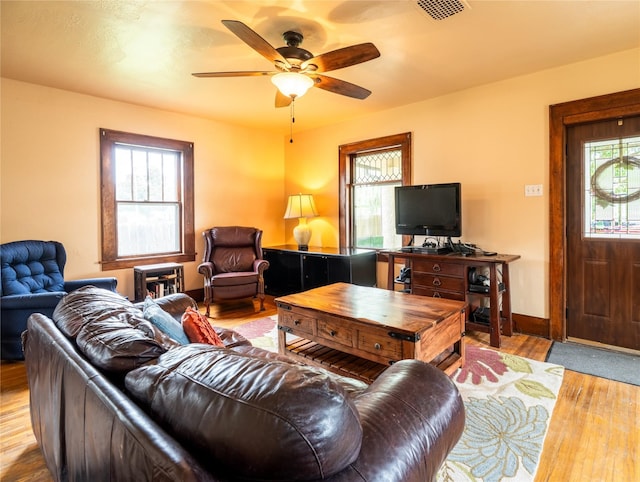 1014 14th St, Boone, IA 50036 - living area featuring wood finished floors and a ceiling fan