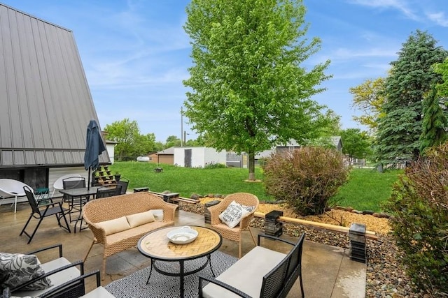 306 E Buchanan St, Baxter, IA 50028 - view of patio / terrace featuring an outdoor hangout area and outdoor dining space