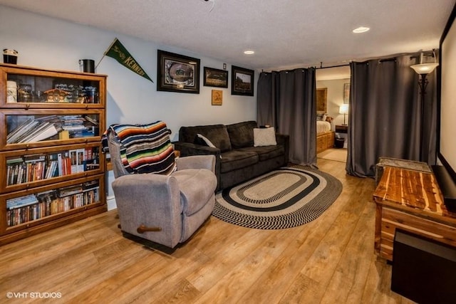 4511 66th St, Urbandale, IA 50322 - living room with wood finished floors and recessed lighting