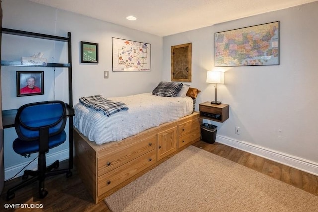 4511 66th St, Urbandale, IA 50322 - bedroom with wood finished floors, baseboards, and recessed lighting