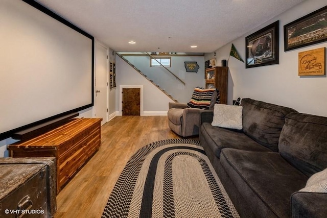 4511 66th St, Urbandale, IA 50322 - cinema room with wood finished floors, recessed lighting, and baseboards