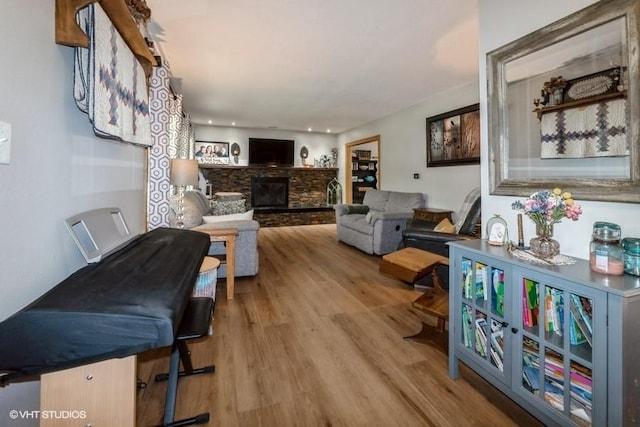4511 66th St, Urbandale, IA 50322 - living area with wood finished floors and a stone fireplace