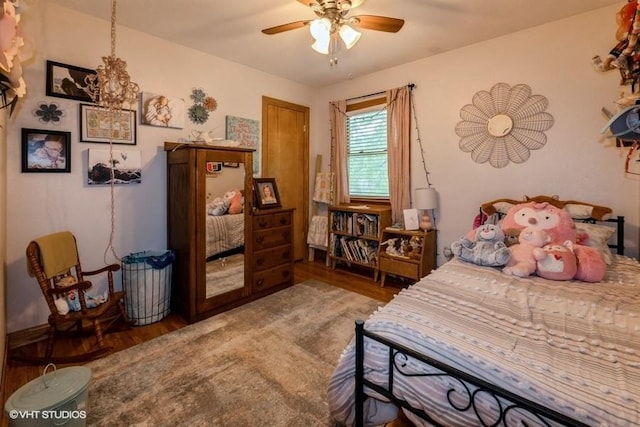 4511 66th St, Urbandale, IA 50322 - bedroom featuring wood finished floors and a ceiling fan