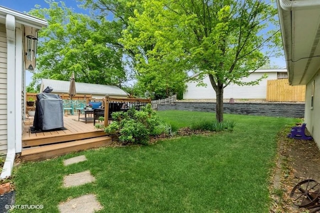 4511 66th St, Urbandale, IA 50322 - view of yard featuring a deck
