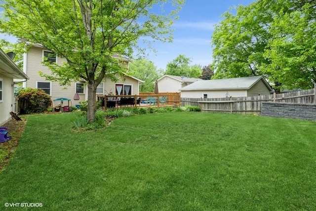 4511 66th St, Urbandale, IA 50322 - view of yard featuring a deck