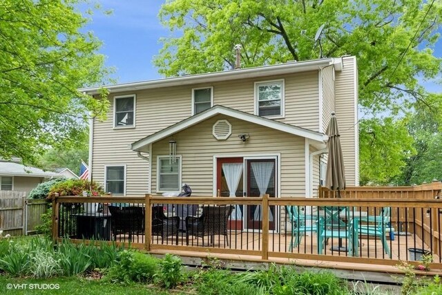 4511 66th St, Urbandale, IA 50322 - rear view of property featuring a deck