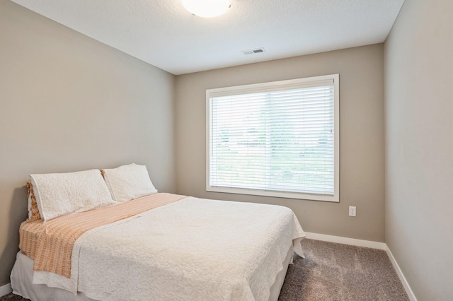 1085 Juniper Dr, Carlisle, IA 50047 - carpeted bedroom featuring baseboards