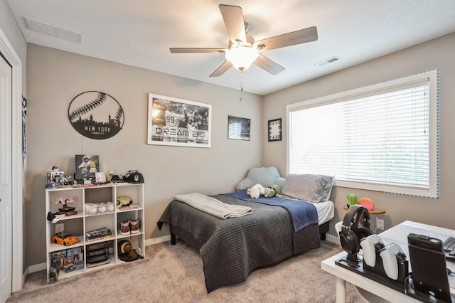 1085 Juniper Dr, Carlisle, IA 50047 - carpeted bedroom featuring baseboards and ceiling fan