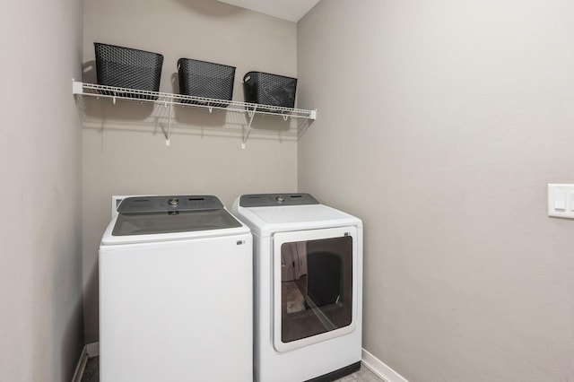 1085 Juniper Dr, Carlisle, IA 50047 - washroom featuring washer and clothes dryer and baseboards