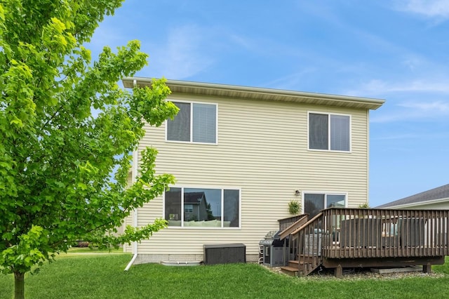 1085 Juniper Dr, Carlisle, IA 50047 - rear view of property with a deck and a lawn