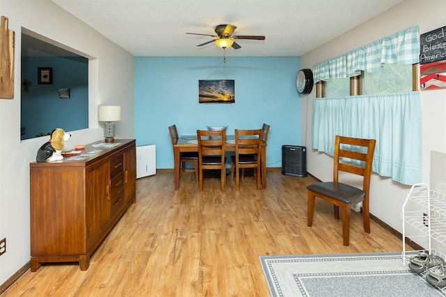 2209 8th Street Ct SW, Altoona, IA 50009 - dining room featuring light wood-style flooring and ceiling fan