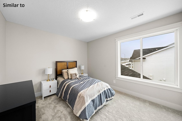 2228 Green Leaf Cir, Norwalk, IA 50211 - bedroom with carpet floors and baseboards