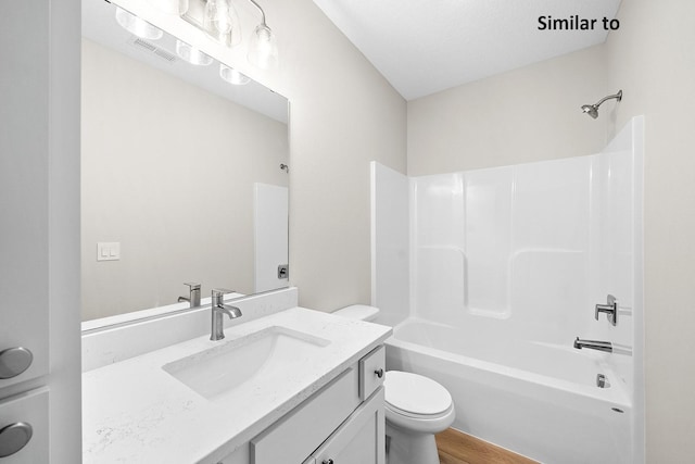 2228 Green Leaf Cir, Norwalk, IA 50211 - full bathroom with toilet, shower / bathtub combination, and vanity